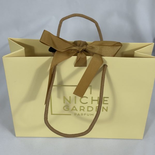 Chic Cream Ribbon Handle Gift Bag with Bow | Paper Bag J002 | HJLUXEPACK custom and luxury packaging provider View 1