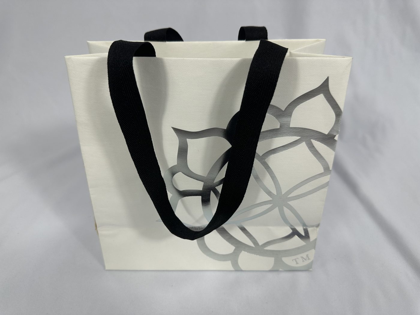 Stylish White Handle Gift Bag with Silver Pattern | Paper Bag J003 | HJLUXEPACK custom and luxury packaging provider View 1