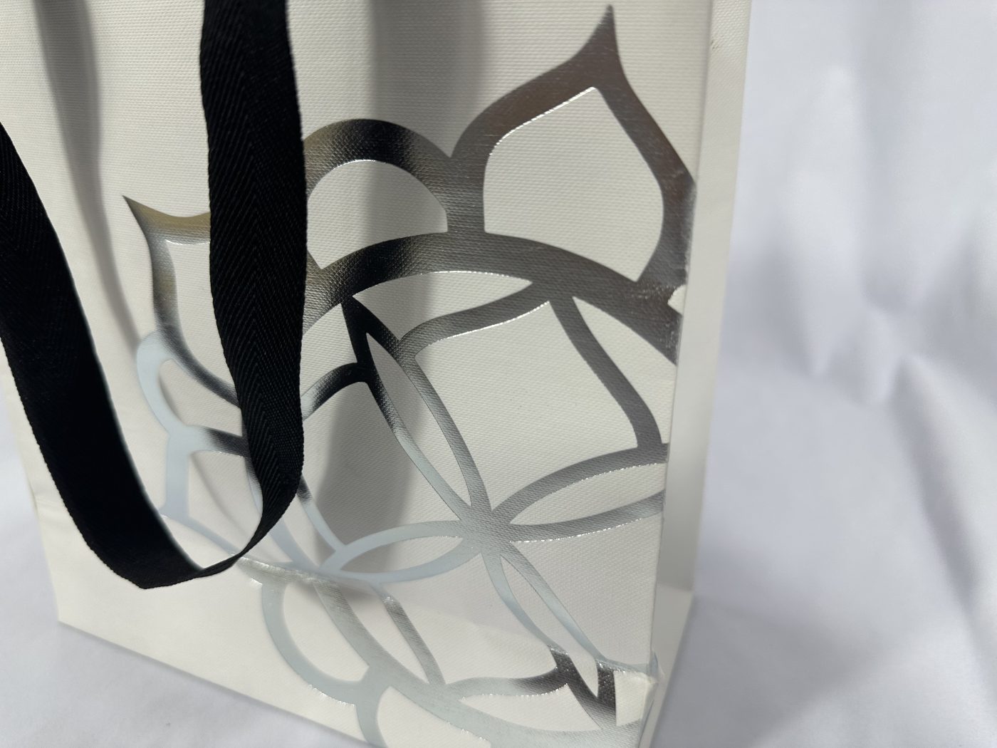 Stylish White Handle Gift Bag with Silver Pattern | Paper Bag J003 | HJLUXEPACK custom and luxury packaging provider View 2