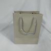 Classic Beige Twisted Rope Handle Gift Bag | Paper Bag J008 | HJLUXEPACK custom and luxury packaging provider View 1